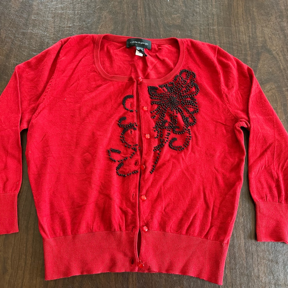 Red embellished cable and gauge cardigan